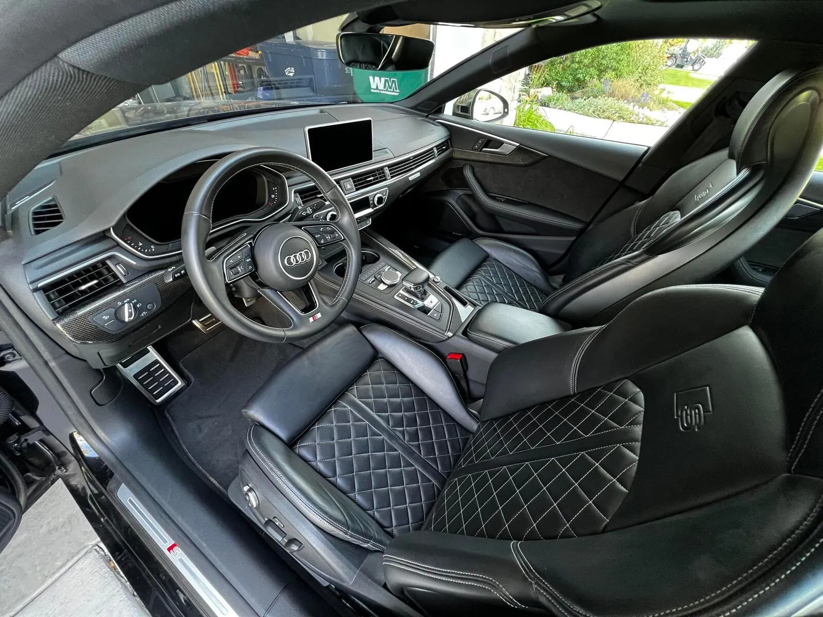 Después · interior de Audi tras detailing profesional y limpieza de tapicerías